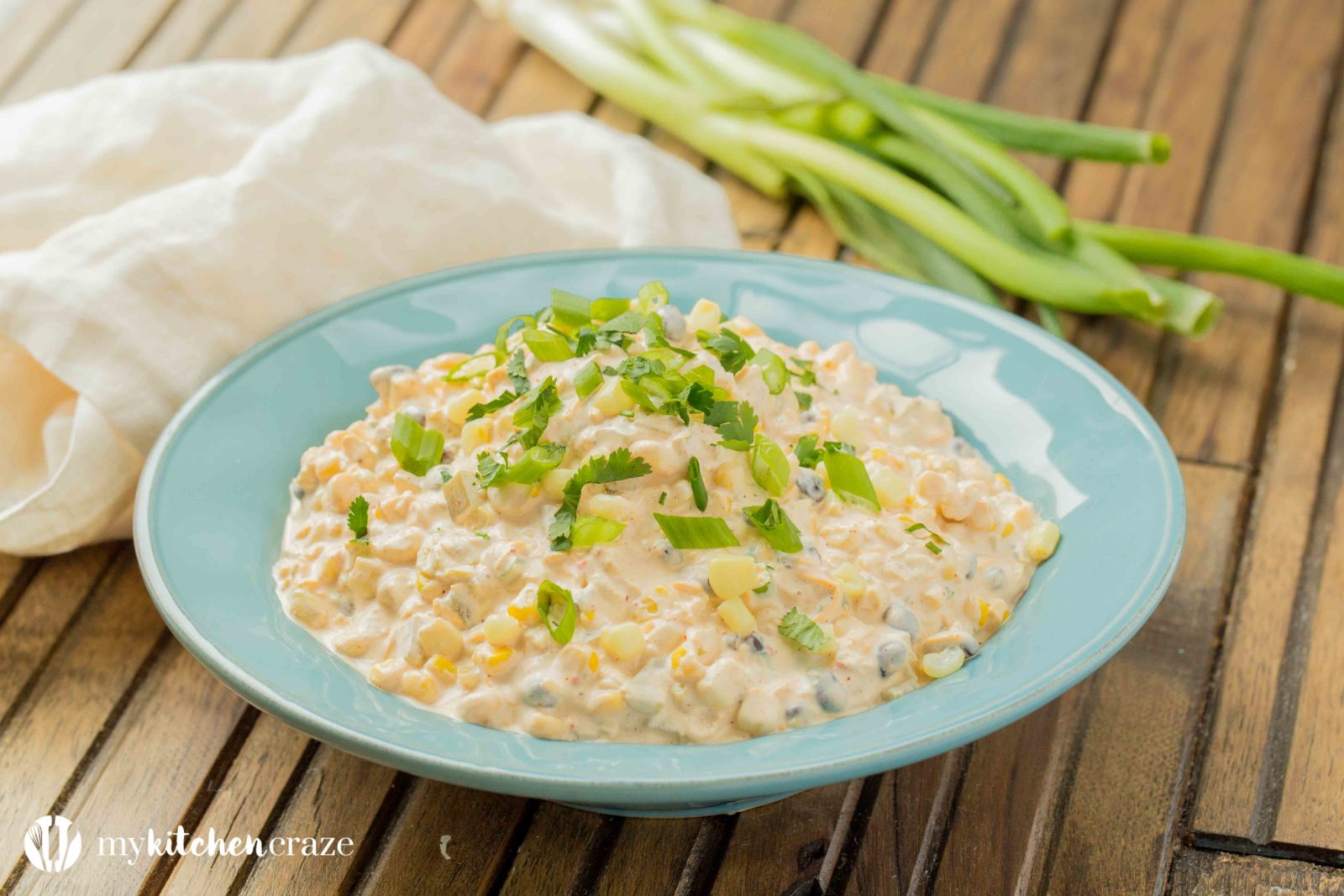 Spicy Corn Dip ~ Loaded with all kinds of yummy ingredients, this dip is perfect for a fun party or family day! Everyone will love this dip!