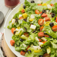 Italian Antipasto Salad ~ loaded with all sorts of flavorful vegetables then topped with a homemade red wine vinaigrette. Perfect as a side dish or grill some chicken, steak or seafood and have it as a main!