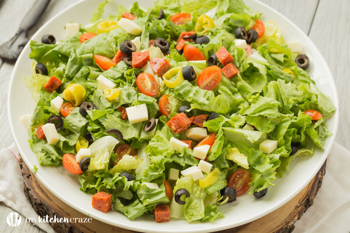 Italian Antipasto Salad ~ loaded with all sorts of flavorful vegetables then topped with a homemade red wine vinaigrette. Perfect as a side dish or grill some chicken, steak or seafood and have it as a main!