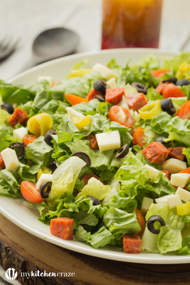 Italian Antipasto Salad ~ loaded with all sorts of flavorful vegetables then topped with a homemade red wine vinaigrette. Perfect as a side dish or grill some chicken, steak or seafood and have it as a main!