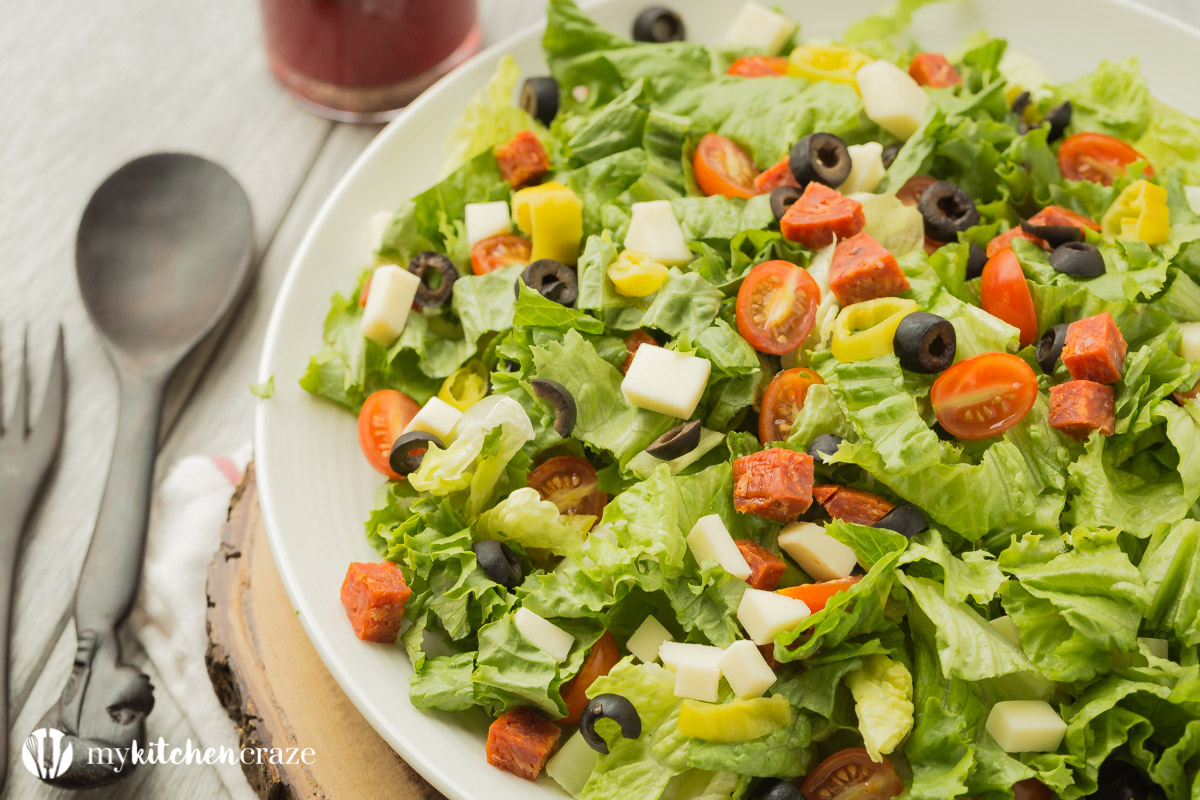 Italian Antipasto Salad ~ loaded with all sorts of flavorful vegetables then topped with a homemade red wine vinaigrette. Perfect as a side dish or grill some chicken, steak or seafood and have it as a main!