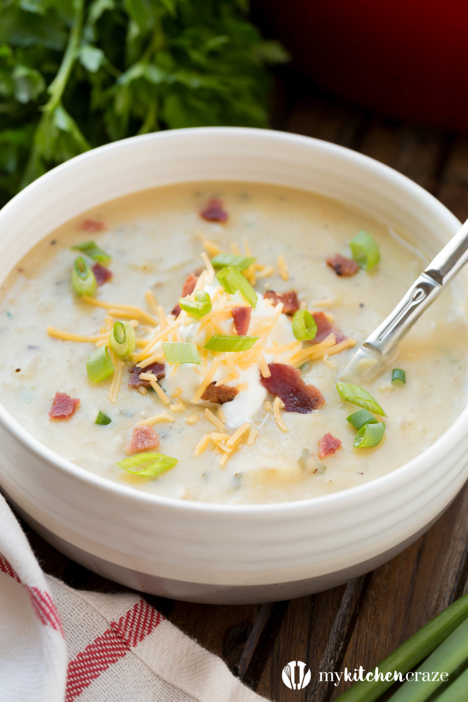 Loaded Potato Soup ~ All the goodness of a baked potato turn into a comforting soup and loaded with all the fixins. Guaranteed to be a winner at the dinner table!