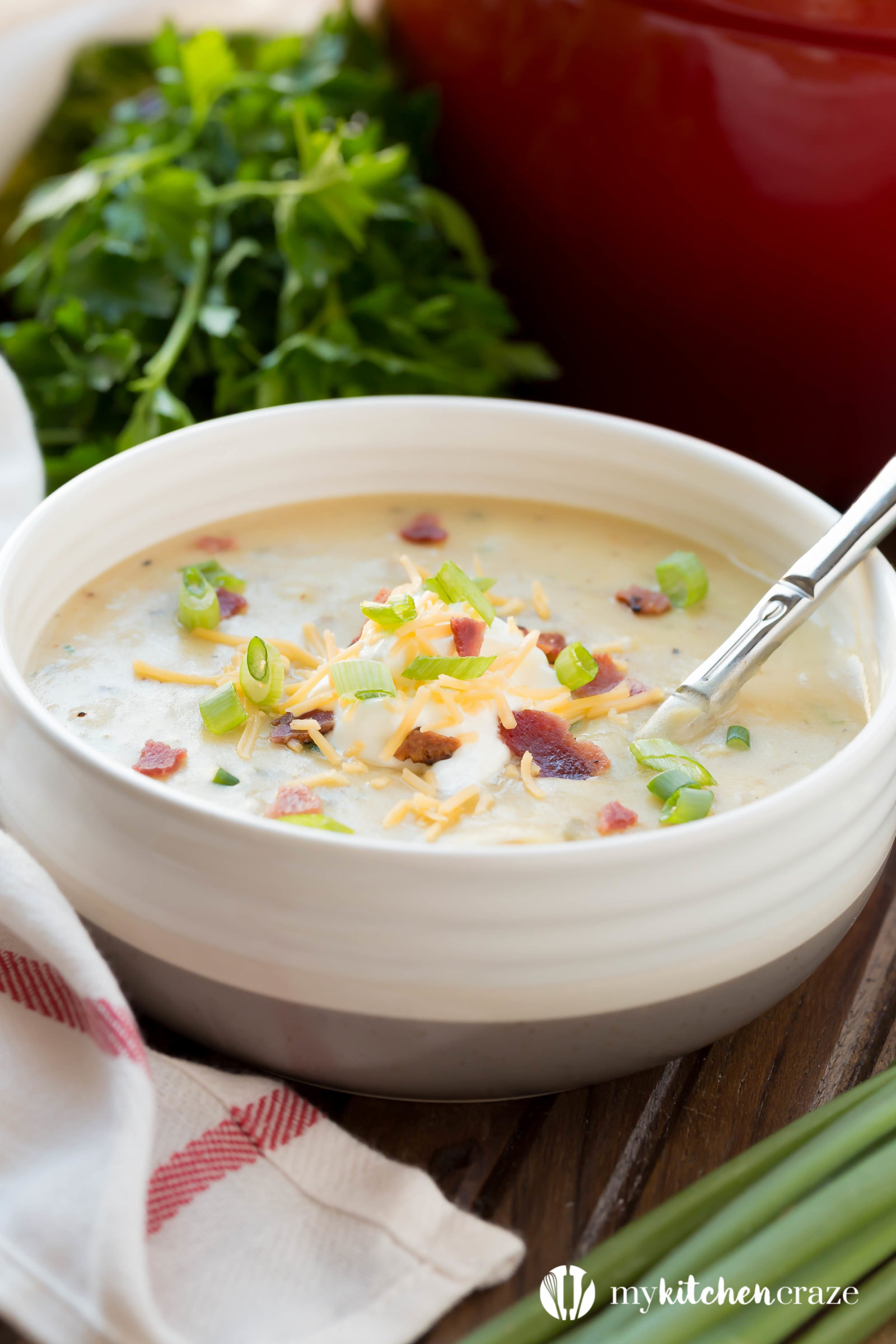 Loaded Potato Soup ~ All the goodness of a baked potato turn into a comforting soup and loaded with all the fixins. Guaranteed to be a winner at the dinner table!