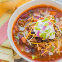 Three Bean Chili is comfort food at it's finest. Loaded with delicious flavor and three different types of beans, this is one soup you can't pass up!