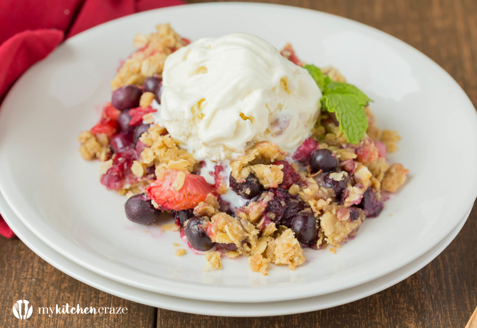 Warm mixed berries topped with crispy oats, make this Triple Berry Crisp a delicious fruit dessert! Serve it with a big scoop of vanilla ice cream or all by its self. It's delicious and a must have this season!