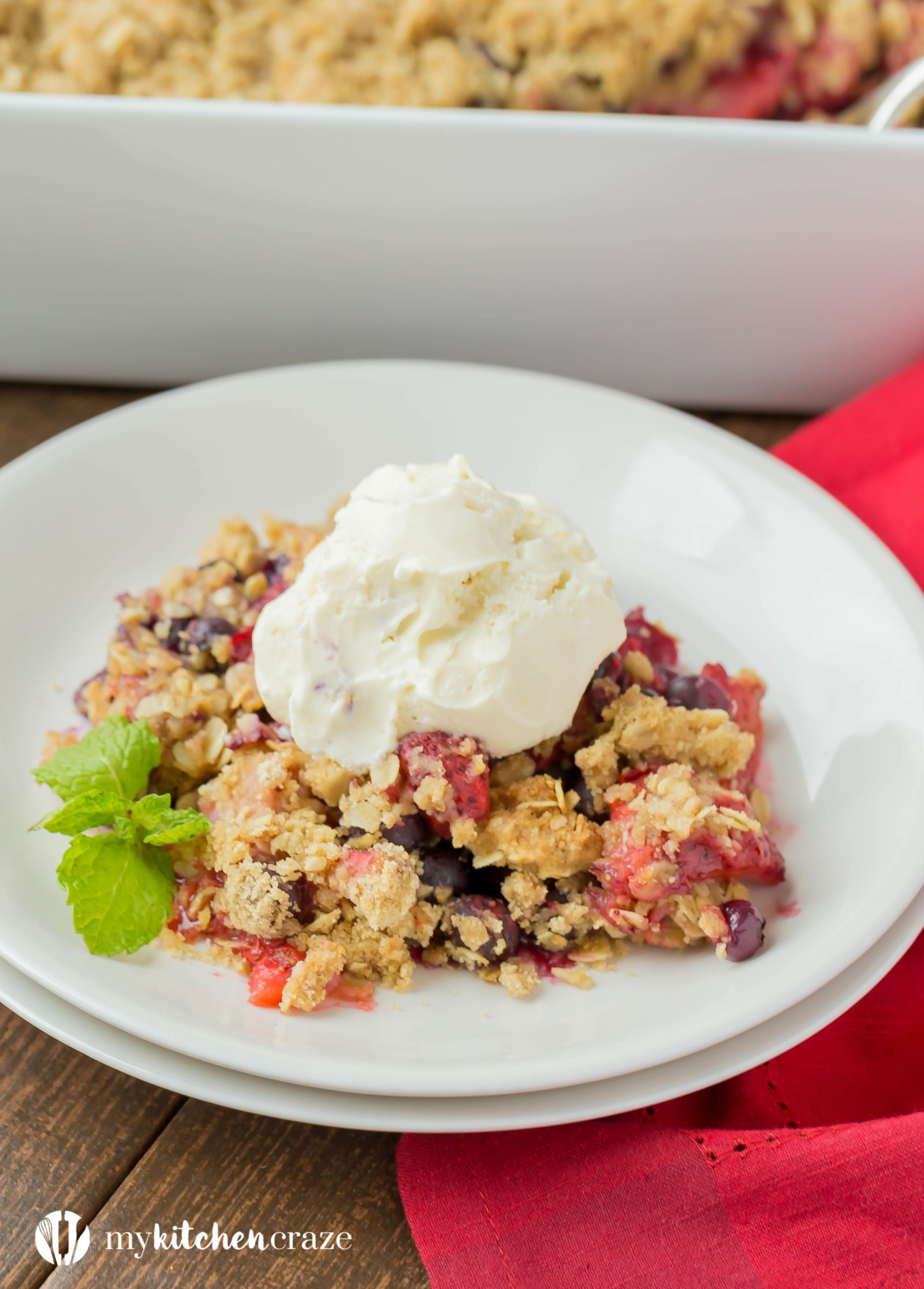 Warm mixed berries topped with crispy oats, make this Triple Berry Crisp a delicious fruit dessert! Serve it with a big scoop of vanilla ice cream or all by its self. It's delicious and a must have this season!