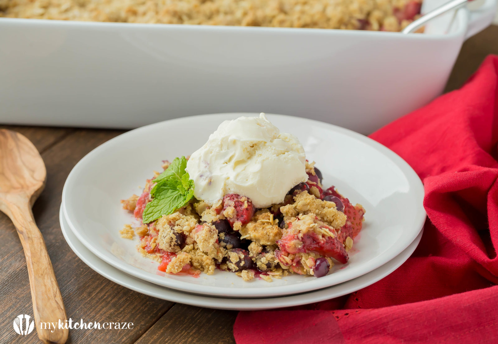 Warm mixed berries topped with crispy oats, make this Triple Berry Crisp a delicious fruit dessert! Serve it with a big scoop of vanilla ice cream or all by its self. It's delicious and a must have this season!