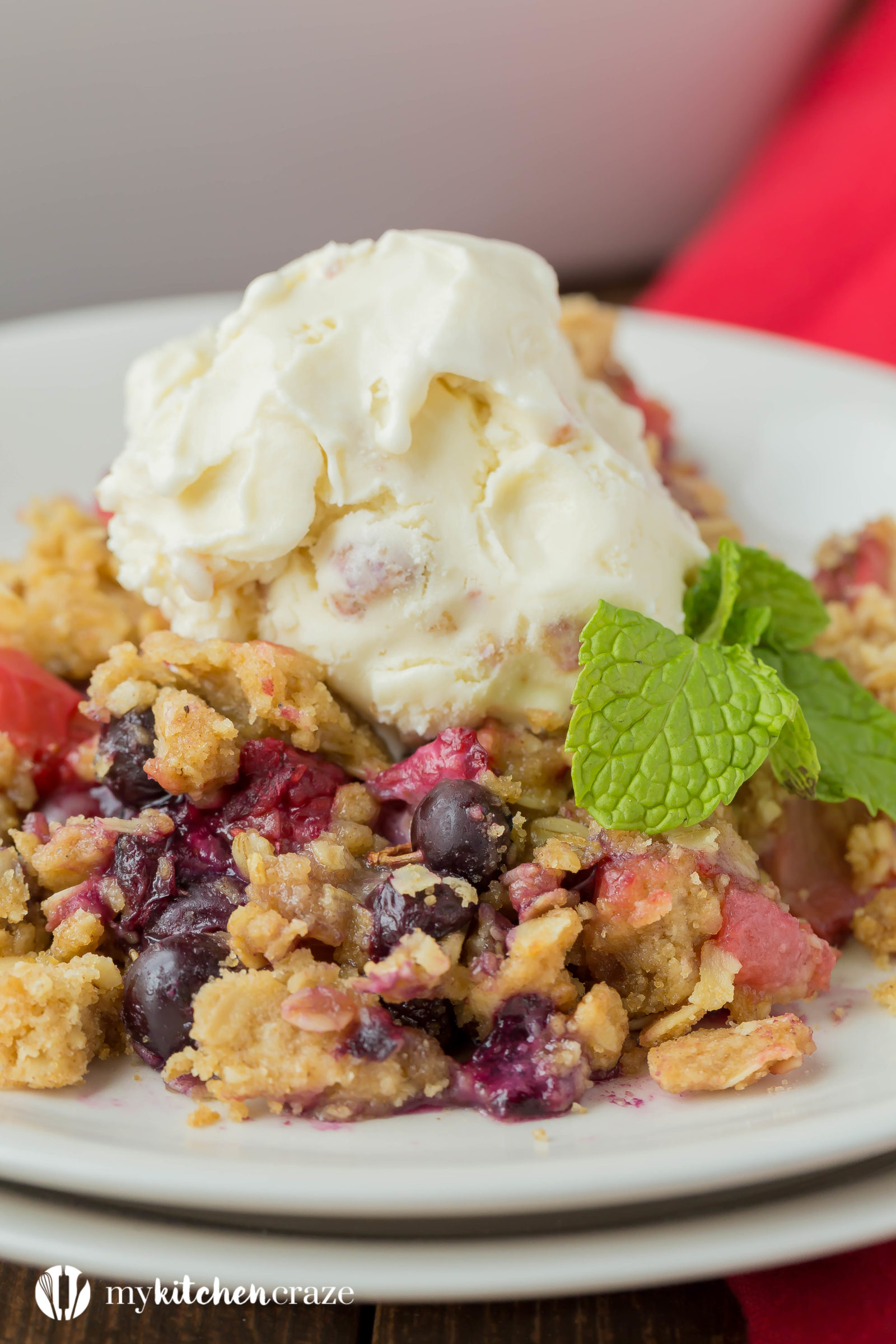 Warm mixed berries topped with crispy oats, make this Triple Berry Crisp a delicious fruit dessert! Serve it with a big scoop of vanilla ice cream or all by its self. It's delicious and a must have this season!