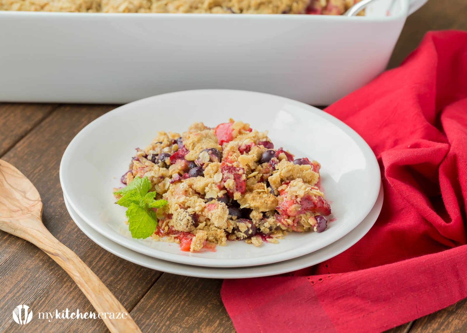 Warm mixed berries topped with crispy oats, make this Triple Berry Crisp a delicious fruit dessert! Serve it with a big scoop of vanilla ice cream or all by its self. It's delicious and a must have this season!