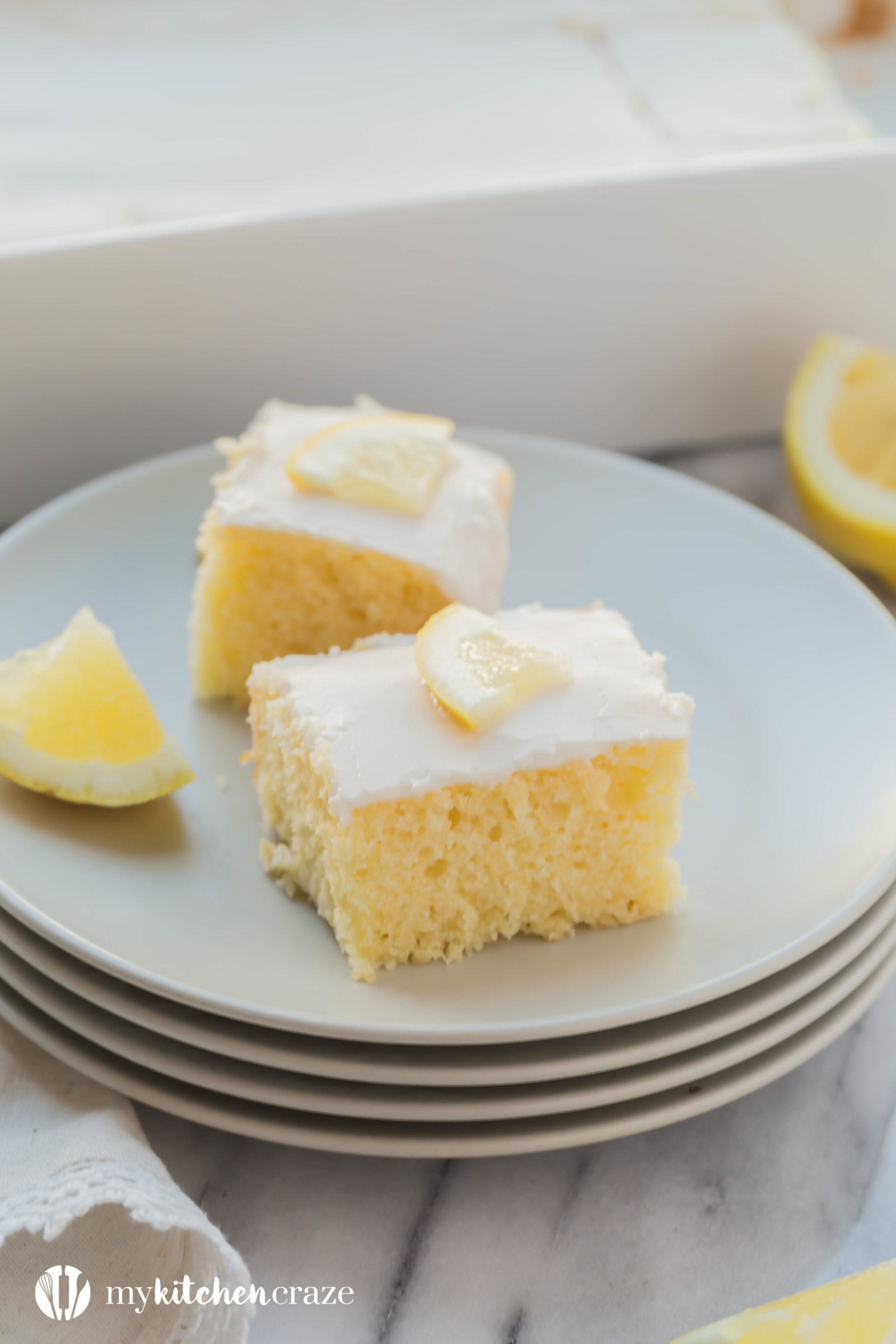 Lemon Velvet Squares are moist and packed with lemon flavor. Topped with a simple lemon glaze, these are one dessert you won't want to pass up. Includes a how to make video too.