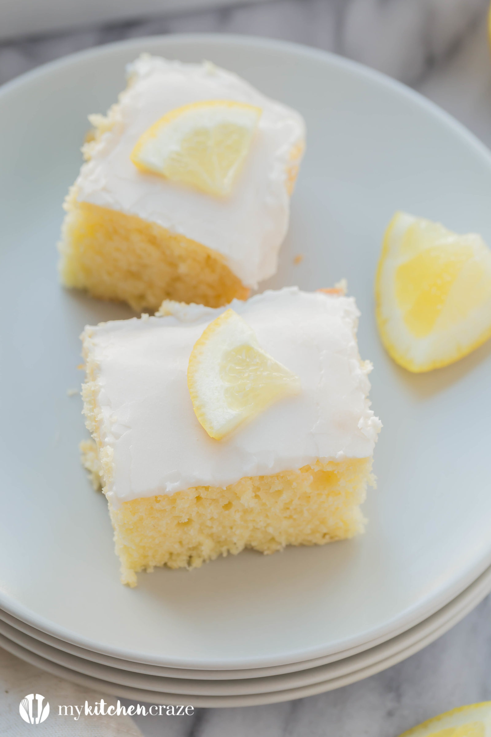 Lemon Velvet Squares are moist and packed with lemon flavor. Topped with a simple lemon glaze, these are one dessert you won't want to pass up. Includes a how to make video too.