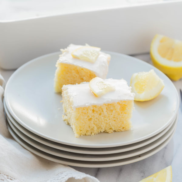 Lemon Velvet Squares are moist and packed with lemon flavor. Topped with a simple lemon glaze, these are one dessert you won't want to pass up. Includes a how to make video too.