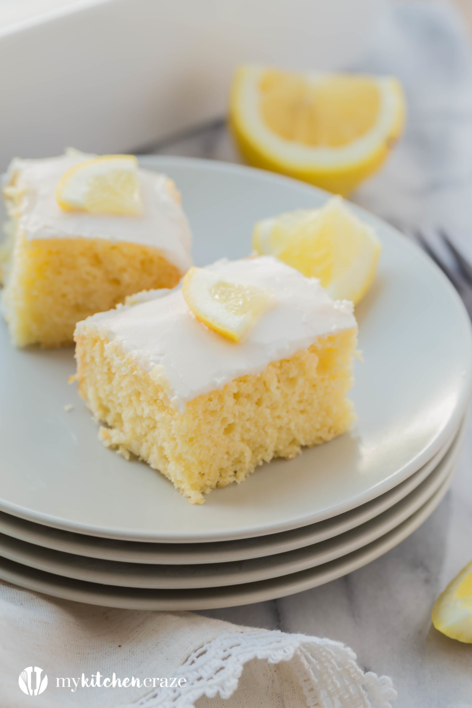 Lemon Velvet Squares are moist and packed with lemon flavor. Topped with a simple lemon glaze, these are one dessert you won't want to pass up. Includes a how to make video too.