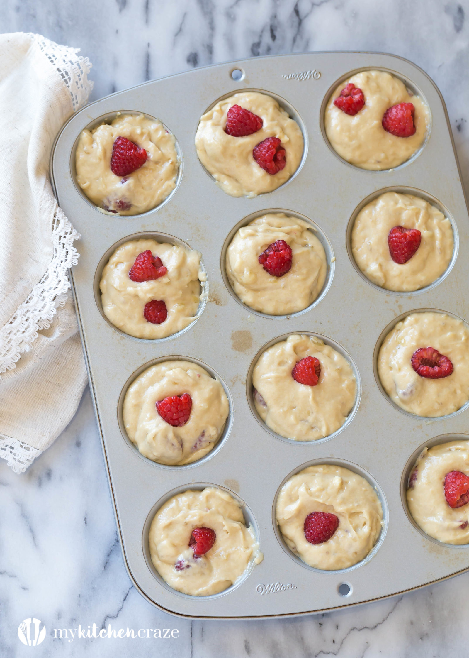 Raspberry Banana Muffins ~ Do you have some ripe bananas and fresh raspberries sitting around? Then you need to make these Raspberry Banana Muffins. Moist and all the right flavors.