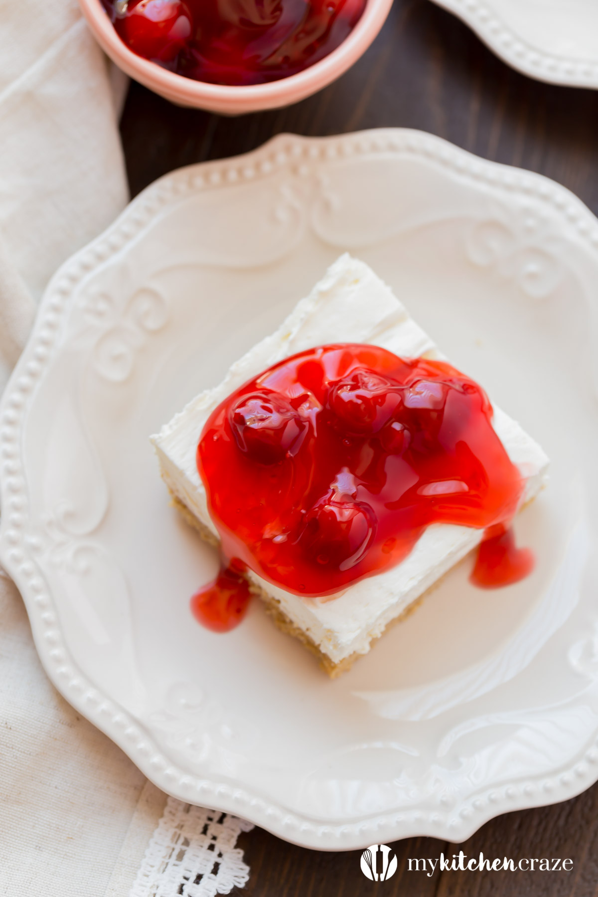 No Bake Cherry Delight is a family favorite. This dessert is a scrumptious no bake dessert and perfect for those hot summer days! #nobake #dessert #cheesecake #cherries