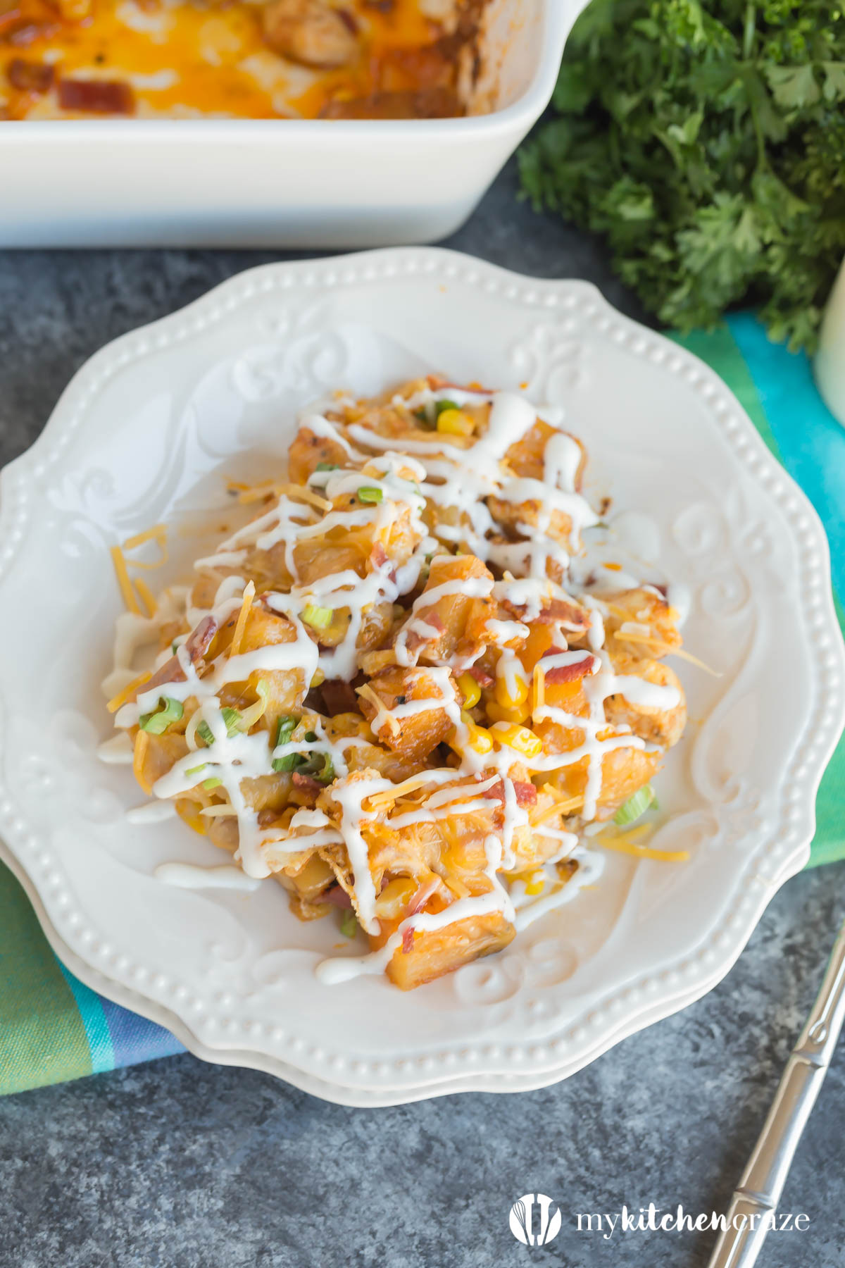 This flavorful Buffalo & Chicken Potato Casserole comes together easily and is always a family favorite dinner recipe!