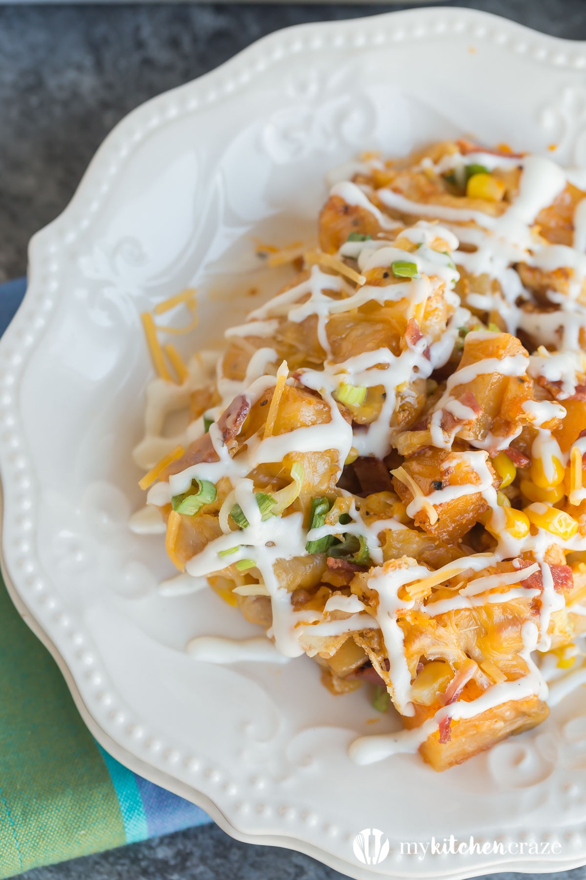 This flavorful Buffalo & Chicken Potato Casserole comes together easily and is always a family favorite dinner recipe!