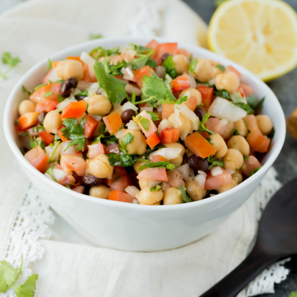 Simple, easy and fresh ingredients are the key to this delicious Tomato Chickpea Salad. You can use it as a side dish or eat it as the main with some protein. Either way, this salad is yummy.