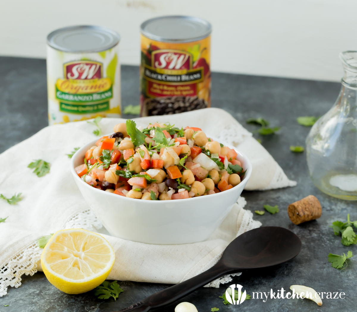 Simple, easy and fresh ingredients are the key to this delicious Tomato Chickpea Salad. You can use it as a side dish or eat it as the main with some protein. Either way, this salad is yummy.