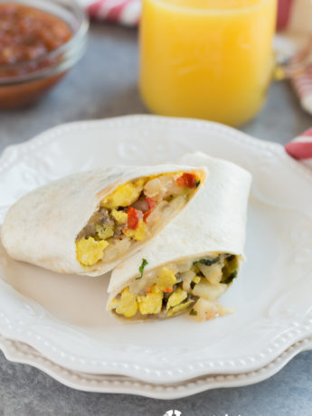 Do you skip breakfast in the mornings because you're just way to busy? Well not any more. Prepare there Freezer Breakfast Burritos during the weekend and have them all week long. Loaded with eggs, sausage, potatoes and of course cheese, these burritos will keep you full all morning long.
