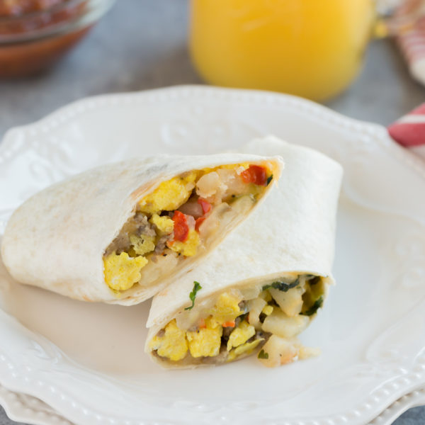 Do you skip breakfast in the mornings because you're just way to busy? Well not any more. Prepare there Freezer Breakfast Burritos during the weekend and have them all week long. Loaded with eggs, sausage, potatoes and of course cheese, these burritos will keep you full all morning long.